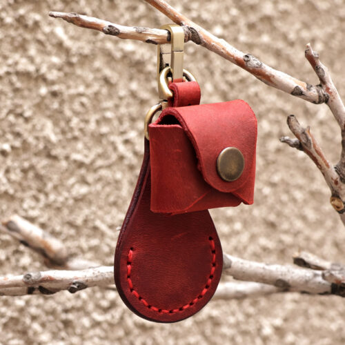 100% Red Leather Earbud Holder and Keychain Set, 'Lucky Melody in Red' 100% Red Leather Earbud Holder and Keychain Set, 'Lucky Melody in Red'