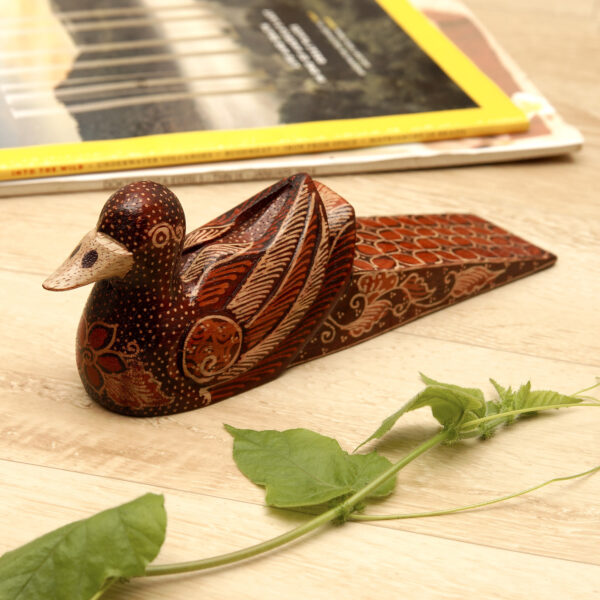 Handmade Batik Duck-Shaped Pule Wood Door Stop in Warm Hues, 'Duck Dimension' Handmade Batik Duck-Shaped Pule Wood Door Stop in Warm Hues, 'Duck Dimension'